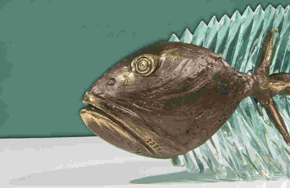 Cast bronze & glass sculpture of a fish. “Frozen Fish”.
