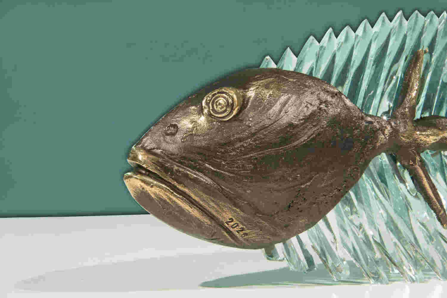 Cast bronze & glass sculpture of a fish. “Frozen Fish”.