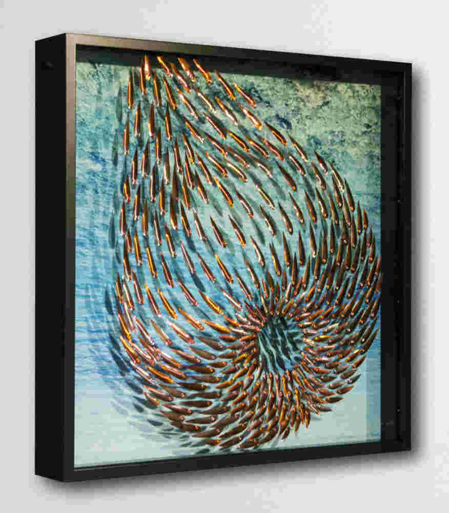 Three-dimensional wall sculpture, school of fish theme, with layers of plexiglass, aluminum frame and swirling copper fish.