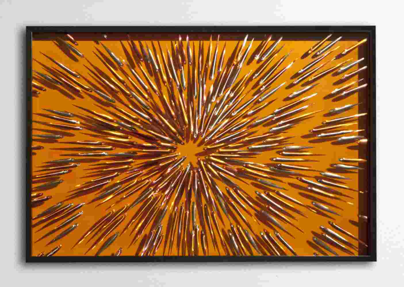 Three-dimensional wall sculpture, school of fish theme, with layers of plexiglass, aluminum frame and exploding copper fish.